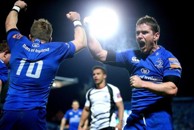 Ian Madigan and Eoin Reddan celebrate