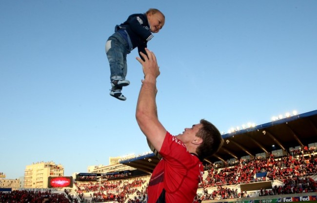 Juan Smith with his son CJ after the game