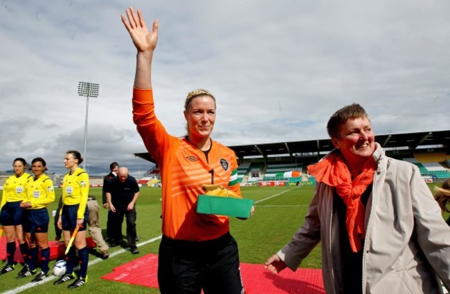 Emma Byrne acknowledges the crowd after receiving her 100th cap