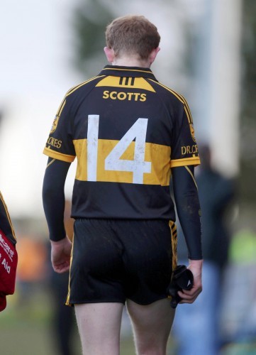 Colm Cooper leaves the field with an injury