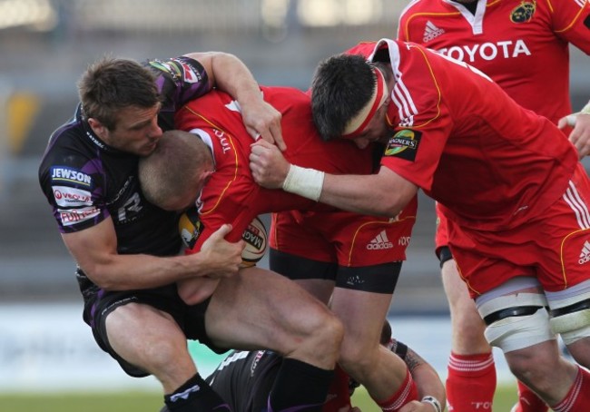Tommy Bowe tackles Keith Earls supported by James Coughlan