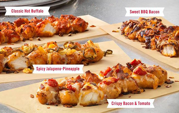 Dominos is now selling pizza with a base made of chicken