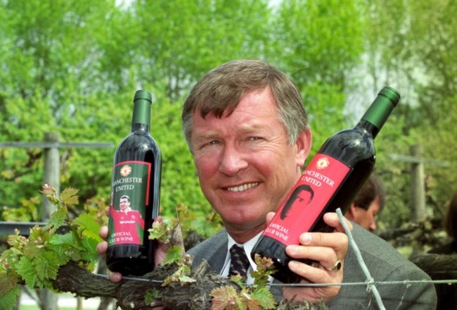 ALEX FERGUSON HOLDS MAN UTD WINE