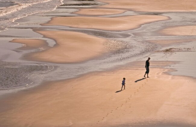 p80-81 Father and son on beach