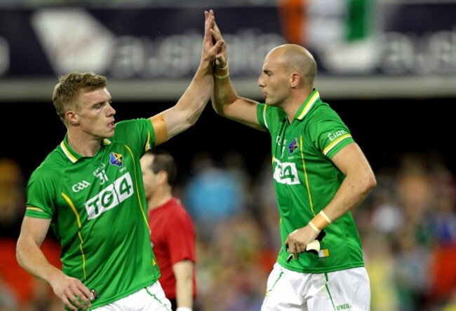 Tommy Walsh celebrates a score with Tadhg Kennelly