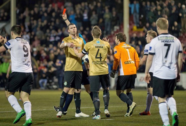 Connor Kenna is shown a red card by referee Paul McLaughlin