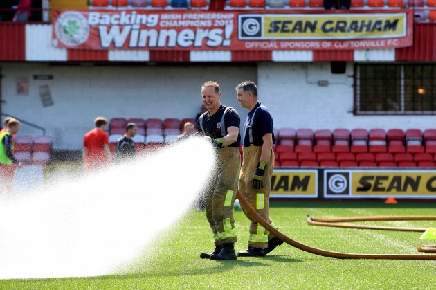 Local Fire crew are called in to help the watering of the 4g pitch at Solitude