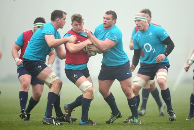 Devin Toner and Jack McGrath tackle Jordi Murphy