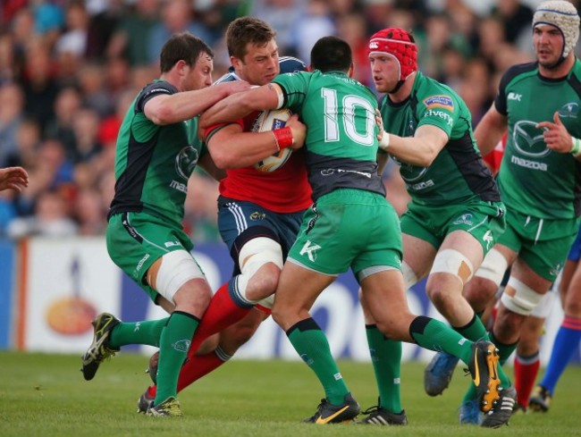 CJ Stander is tackled by Miah Nikora