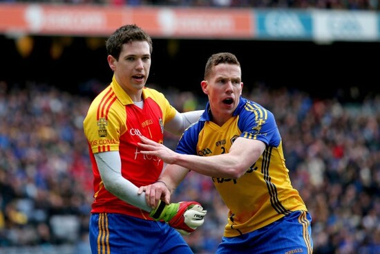 Seanie McDermott congratulates goalkeeper Darren O'Malley after he saved a penalty