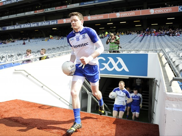 Conor McManus leads the Monaghan team onto the pitch before the game