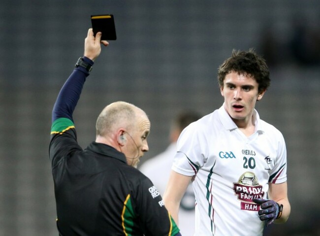Marty Duffy shows David Hyland a black card
