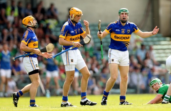 Kieran Bergin, Shane McGrath and Noel McGrath dejected