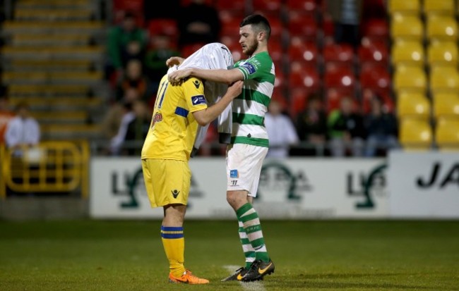 Ryan Brennan helps Shane Tracy put on a goalkeeper jersey