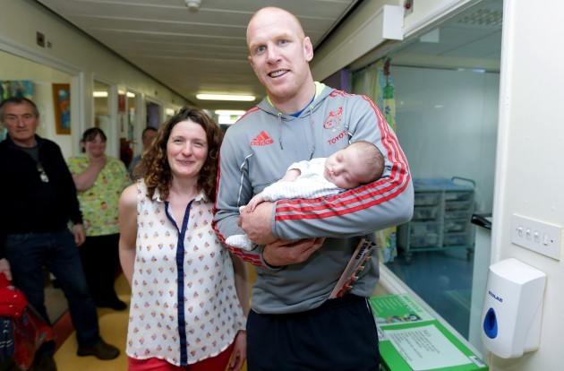 Paul O'Connell with baby Rian and mother Catherine Murphy