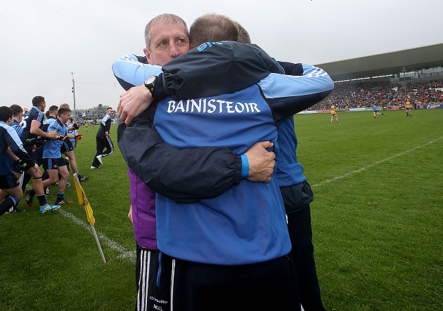 Dessie Farrell celebrates with his back room staff after the game