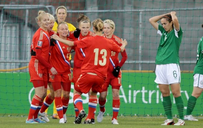 Ekaterina Pantyukhina is congratulated by teammates