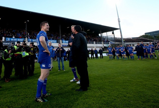 Brian O'Driscoll and Leo Cullen speak to the crowd after the game