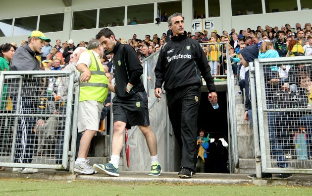 Mark McHugh and manager Jim McGuinness take to the field