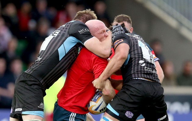 Paul O'Connell tackled by Al Kellock and Josh Strauss