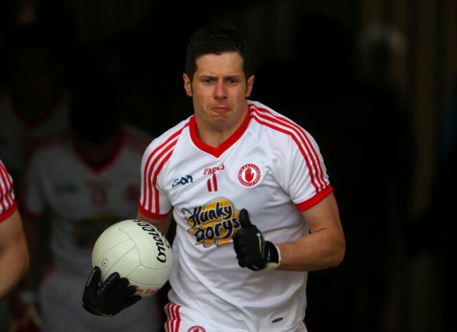 Sean Cavanagh leads out the team