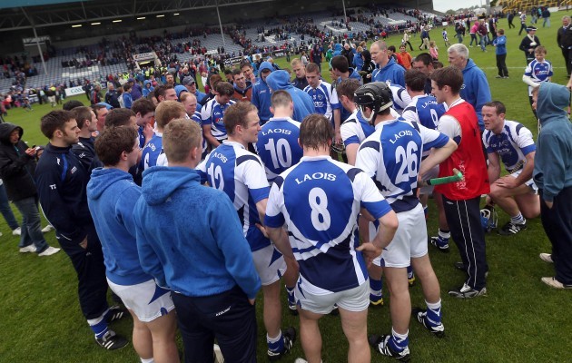Laois team huddle at the end of the game