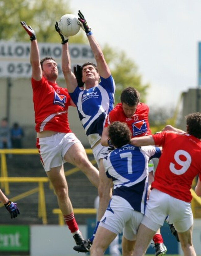 Derek Crilly and Brendan Quigley compete for a high ball