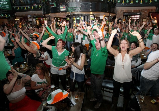 Irish fans celebrate Ireland's first goal of the game