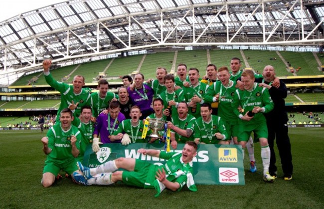 St Michael's team celebrate with the trophy