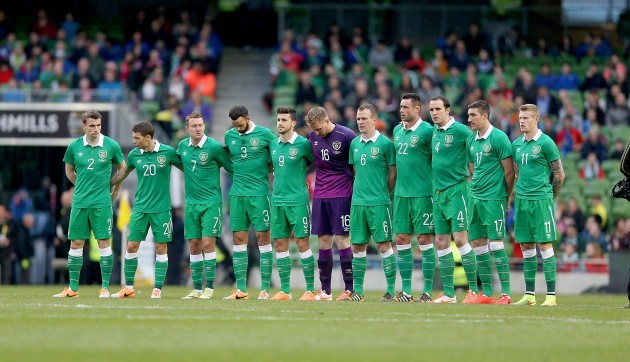 The Ireland team stand for a moments silence