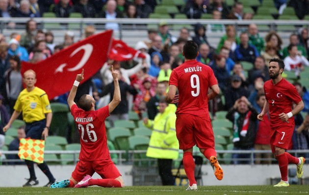 Ahmet Ilhan Ozek celebrates scoring
