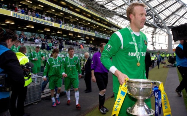 James Walsh celebrates with the trophy