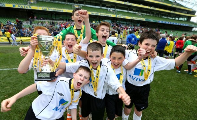 Pupils from Scoil Mhire na mBuachailli celebrate winning