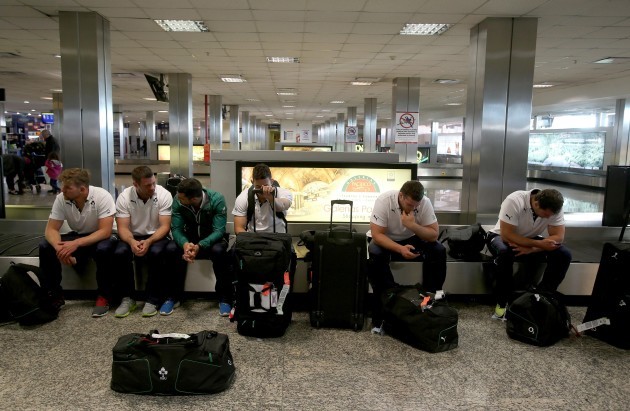 The Ireland players await their bags