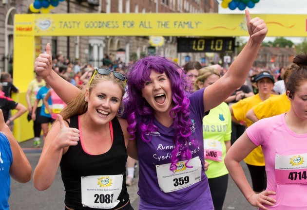 Mairead Giblin and Mary Melvin at the finish of the Flora Women's Mini Marathon