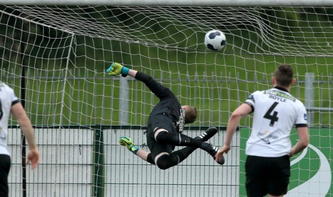 Peter Cherrie is beaten in the third minute by a UCD strike