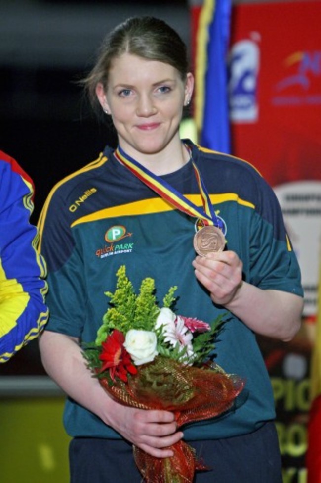 Clare Grace celebrates with her bronze medal