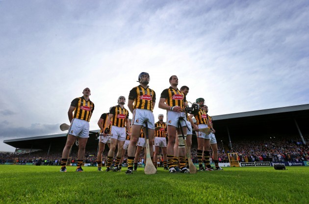 Kilkenny players stand for the national anthem