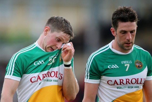 A dejected Chris McDonald and Cathal Parlon
