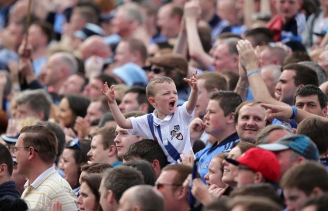 A young Dublin fan cheers