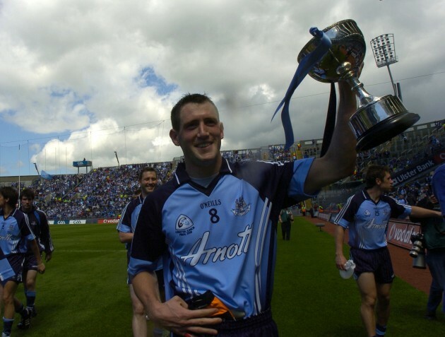 Dennis Bastic parades the cup around Croke Park