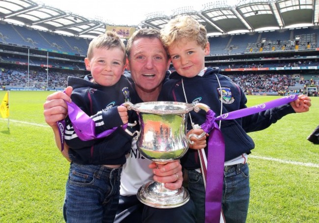 Alan Mulholland celebrates with his sons Tom and Harry