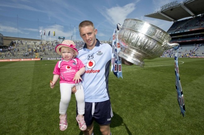 Eoghan O'Gara and daughter Ella celebrate with the Delaney Cup