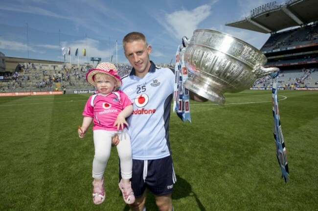 Eoghan O'Gara and daughter Ella celebrate with the Delaney Cup