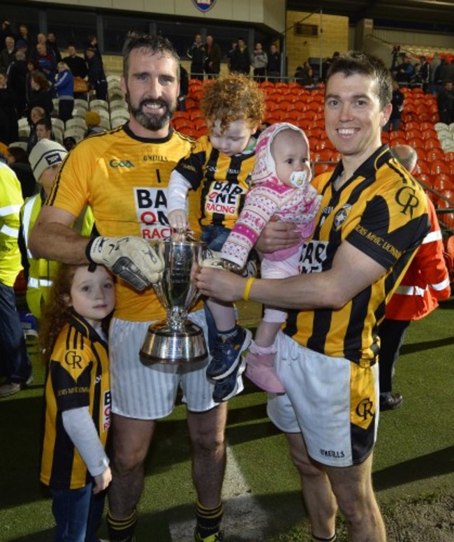 Paul Hearty with his children Breanne and Oran and Stephen Kernan with his daughter Sophie with the Gerry Fagan Cup