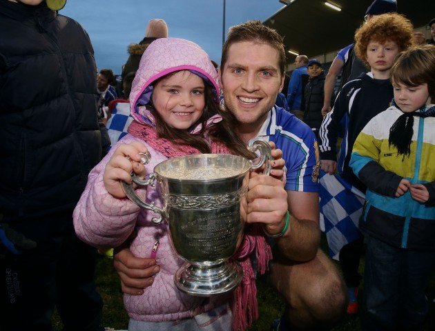 Conal Keaney celebrates winning with his daughter Kate