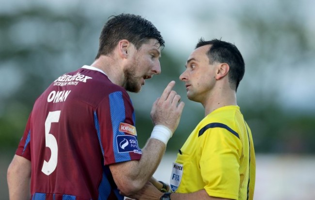 St. Patrick's Athletic's Ken Oman argues with referee Neil Doyle after being shown a red card