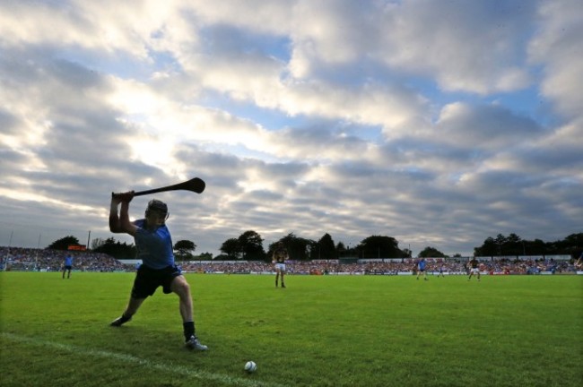 Alan McCrabbe takes a sideline cut