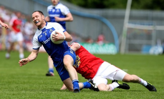 Vinny Corey tackled by Conor Gormley