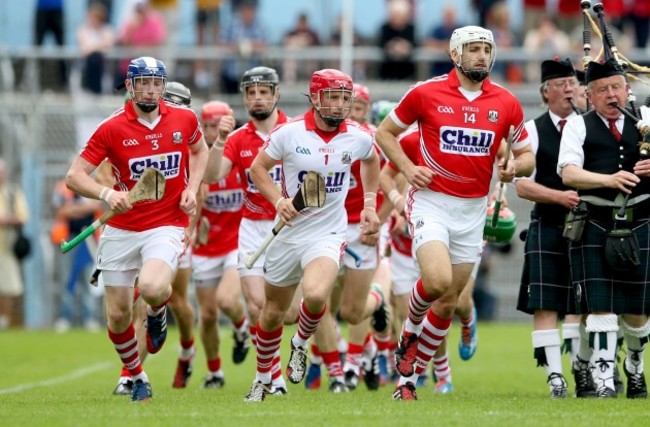 Damien Cahalane, goalkeeper Anthony Nash and Patrick Cronin break from the parade before the game